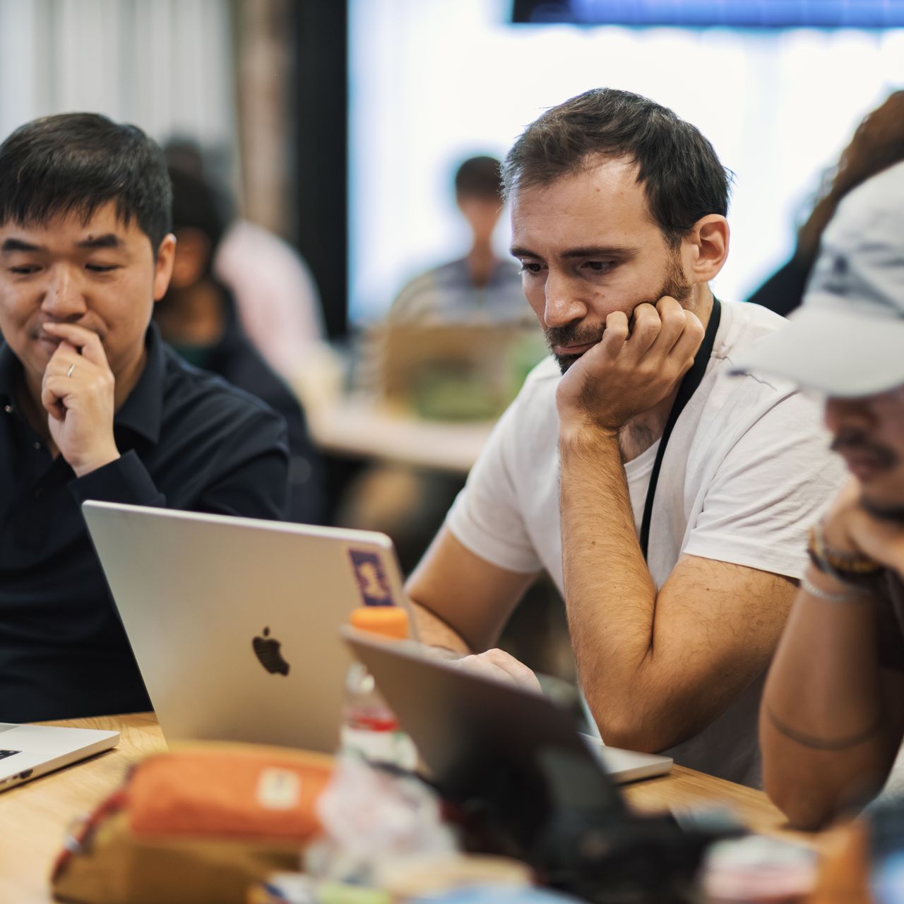 A software team reviewing code together