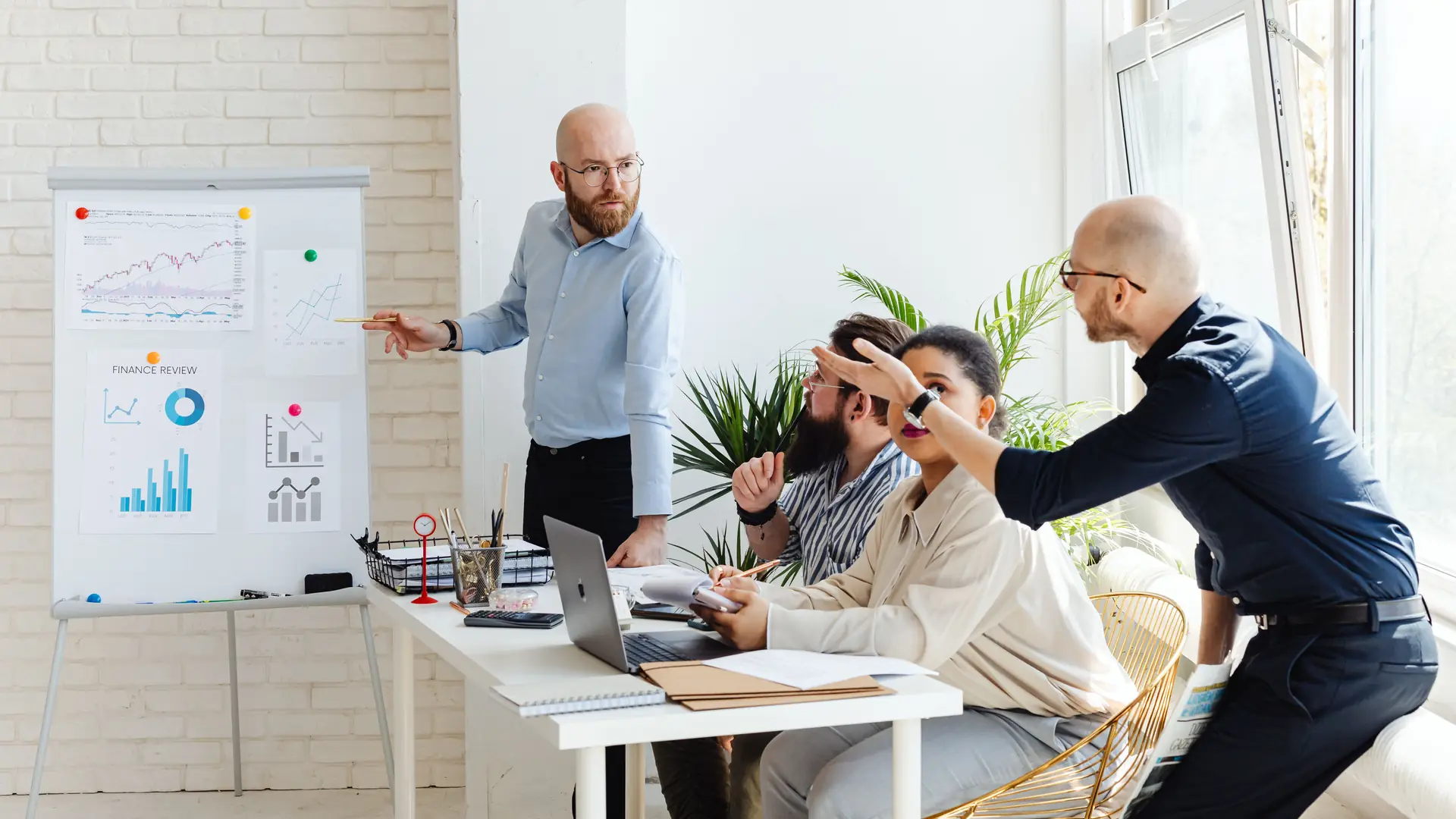 A consultancy session running through charts on a whiteboard