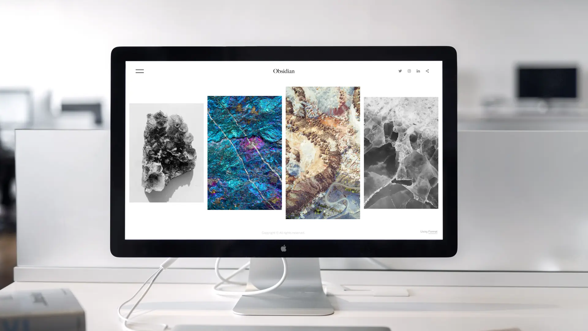 A corporate website design open on a desktop screen